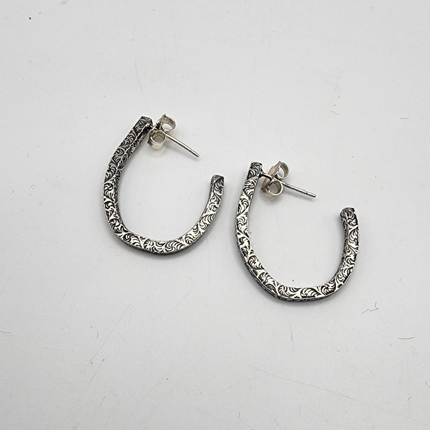 Embossed hoops