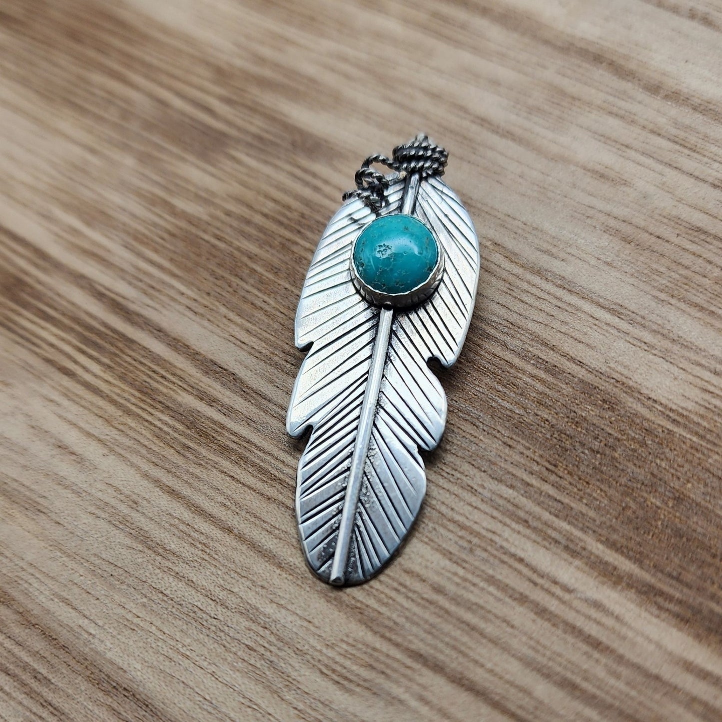 Tibetan turquoise feather pendant
