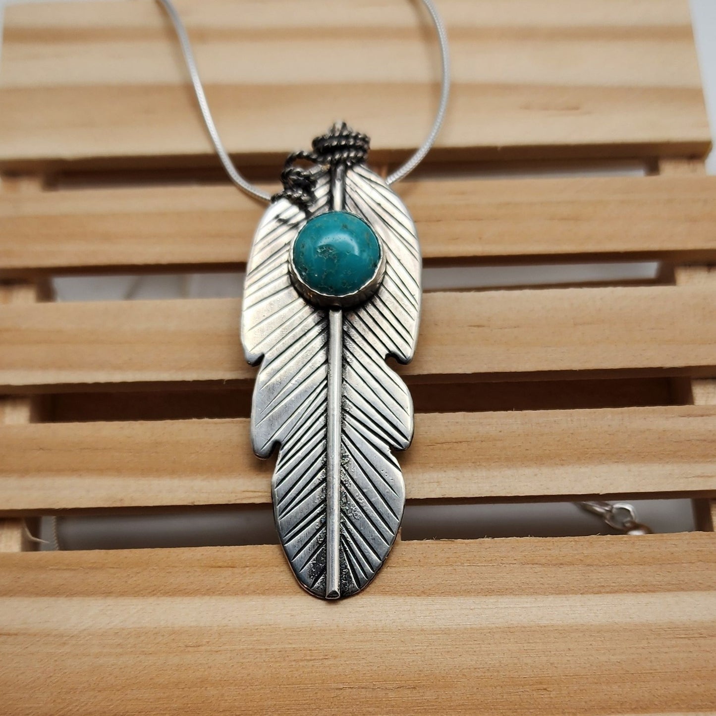 Tibetan turquoise feather pendant