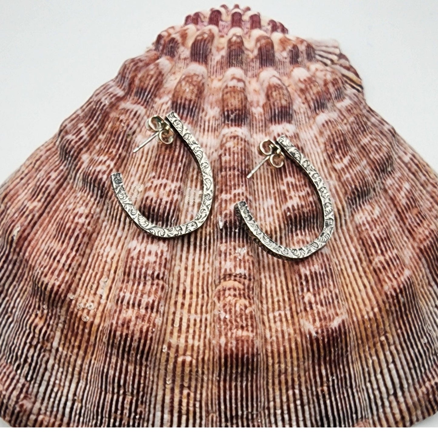 Embossed hoops